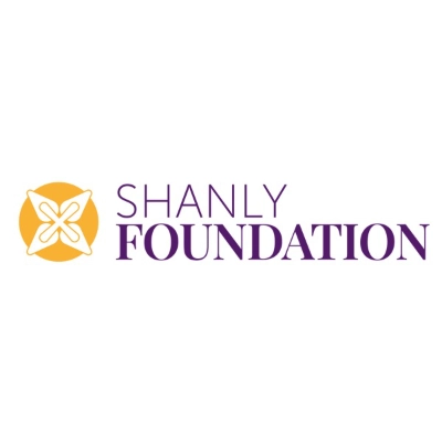 Shanly Foundation logo with a gold circular emblem on the left and the organisation's name in purple text on a white background.